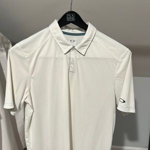 Oakley cream polo size Large
